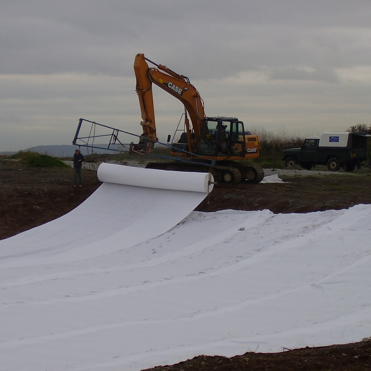 aquaSHIELD underlay laid out before a lake liner installation